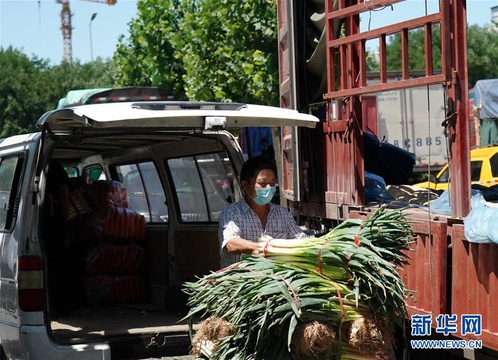 北京:指定临时交易场地 保障蔬菜水果供应 第1页