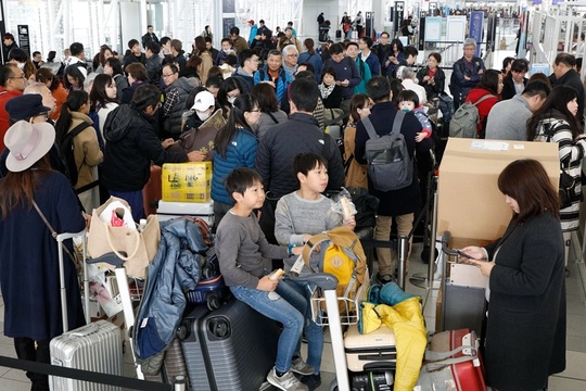 日本新年假期临近 当地机场人潮涌动 第1页